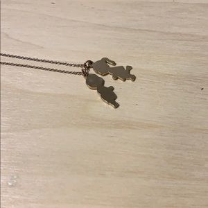 Gold boy/girl kissing necklace